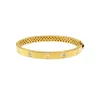 Brazalete de Oro Tornillos y Diamantes Armonía 6mm